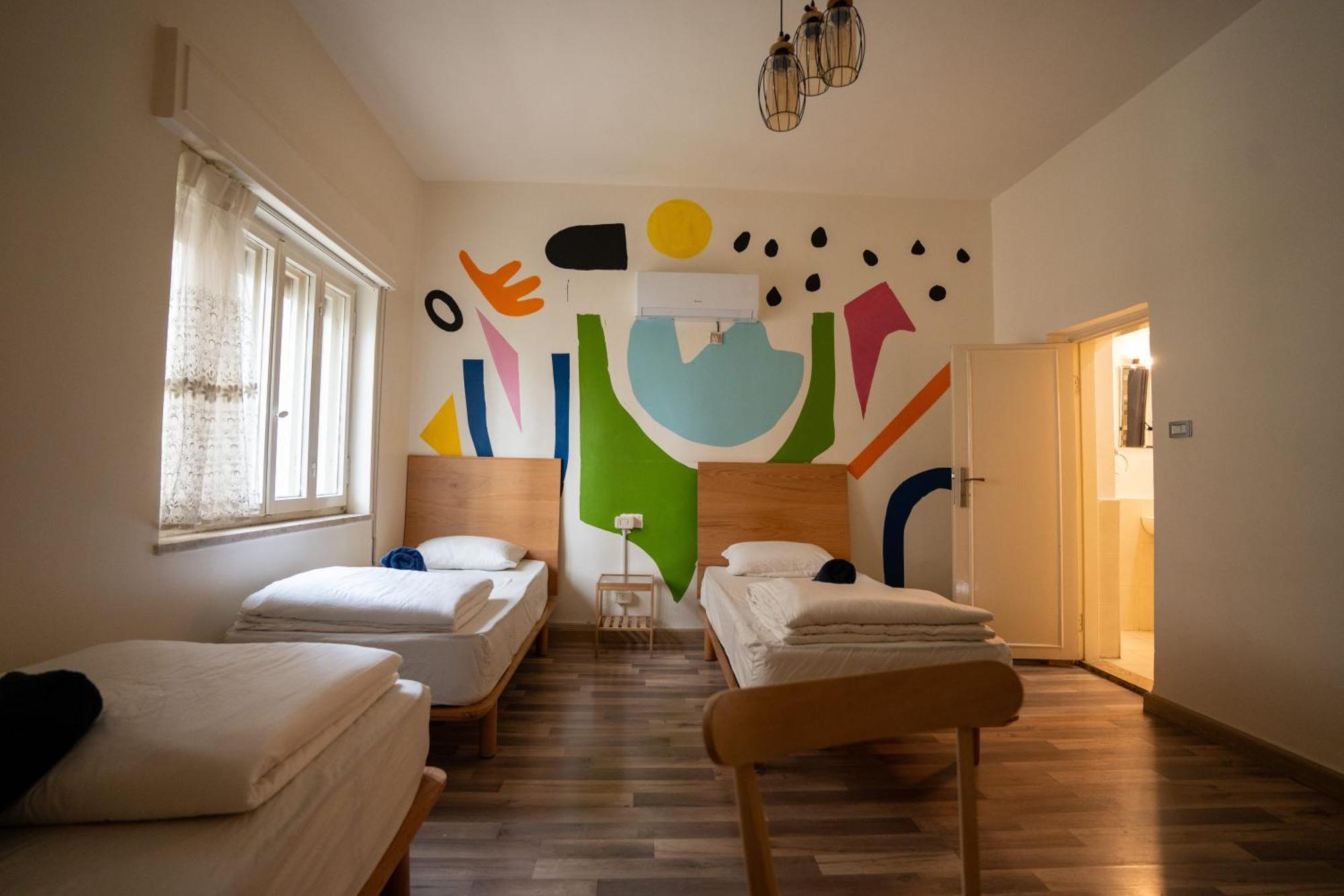 Battuta Hostel Amán Habitación foto