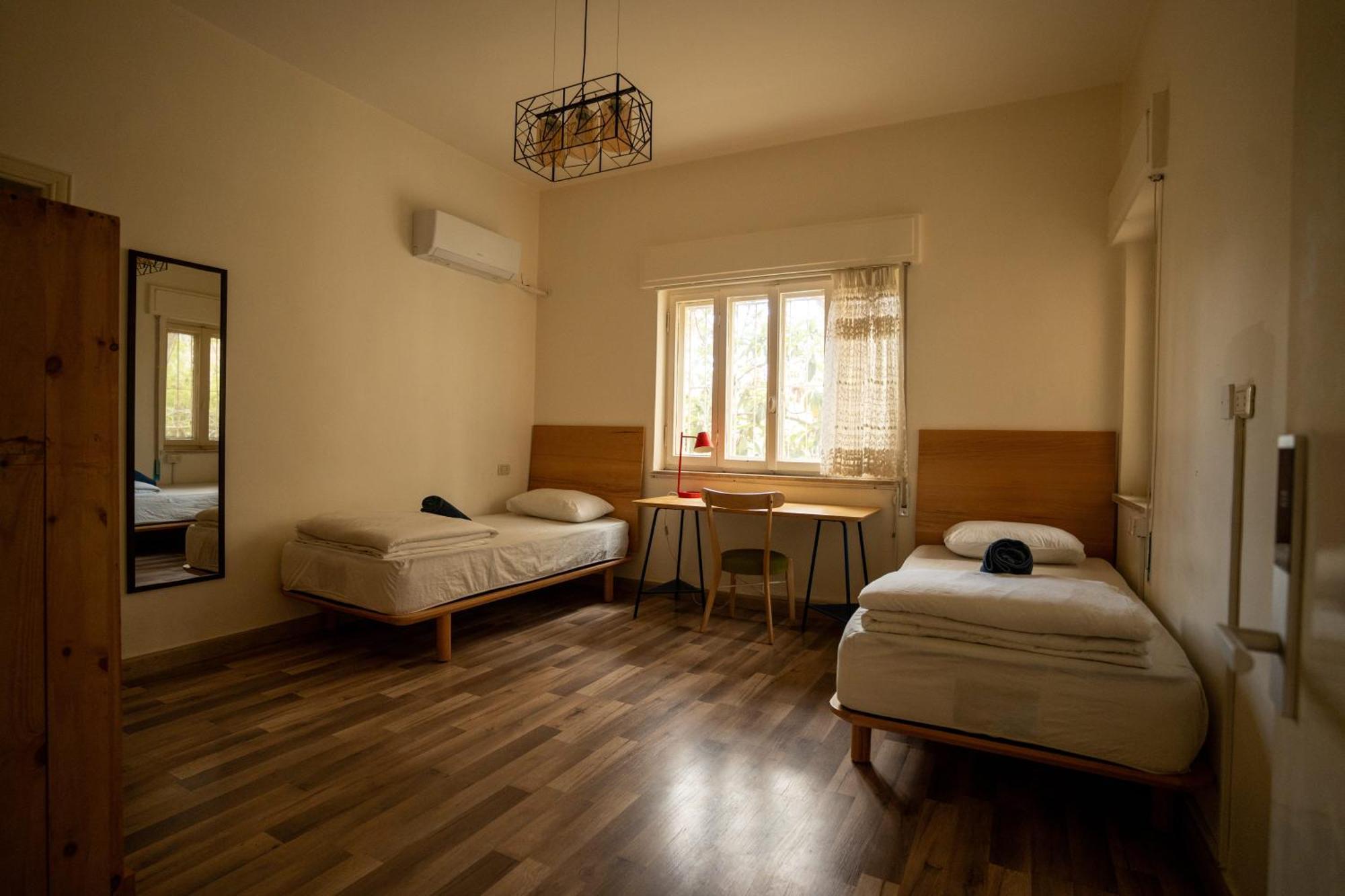 Battuta Hostel Amán Habitación foto