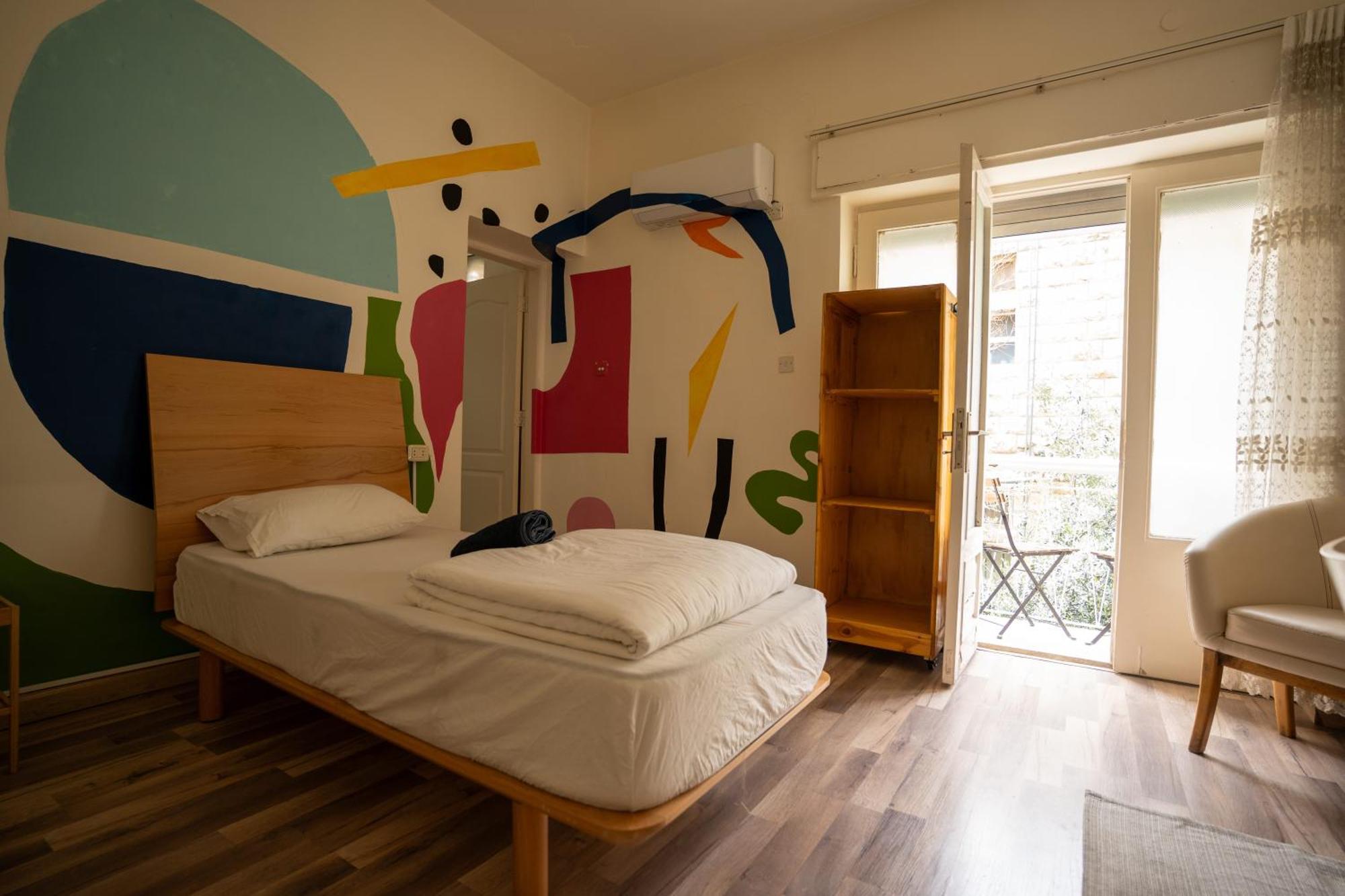 Battuta Hostel Amán Habitación foto
