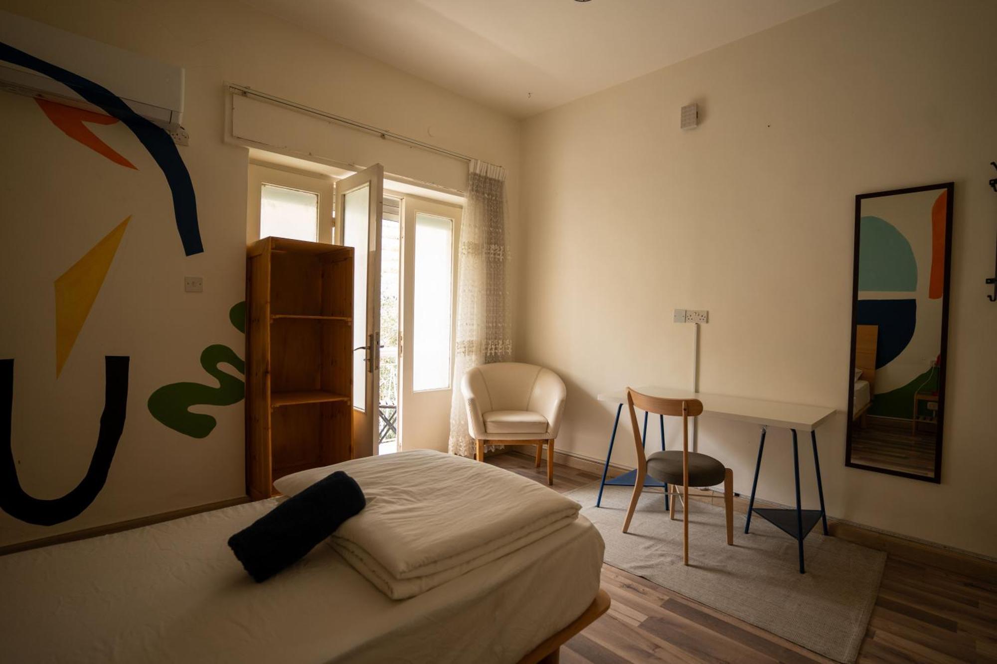 Battuta Hostel Amán Habitación foto